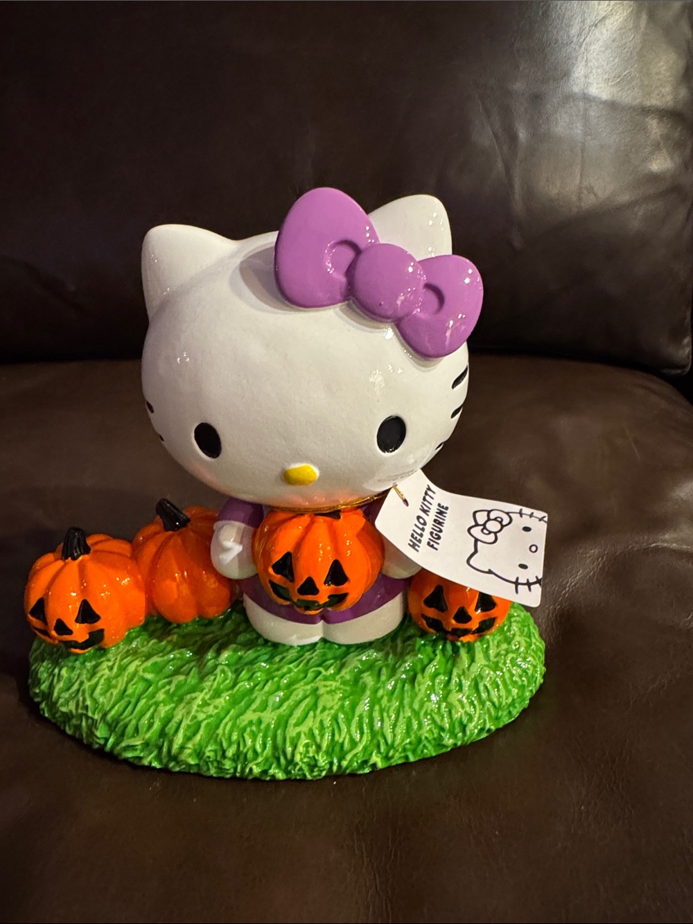 Hello Kitty Halloween Figurine in Purple with Orange Pumpkins